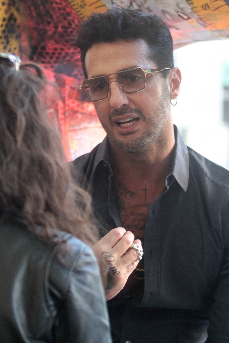 Fabrizio Corona a un party 11