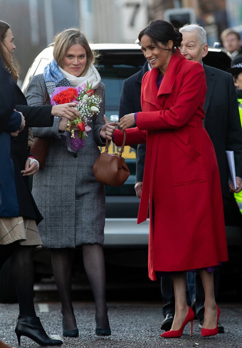 Meghan Markle in rosso per un poeta: foto 8