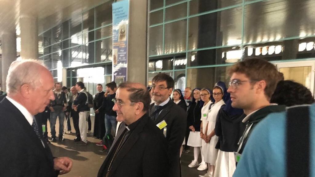 La coppia di volontari e il cronista tornato dal "buio"