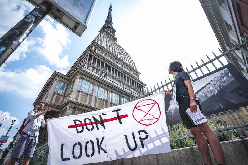 Extinction Rebellion occupa la Mole Antonelliana: le immagini da Torino 4