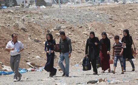 Iracheni in fuga verso il Kurdistan 5