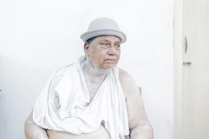 Sarker Protick, secondo premio nelle Daily Life Stories. John indossa il cappello del nipote a Dhaka, in Bangladesh