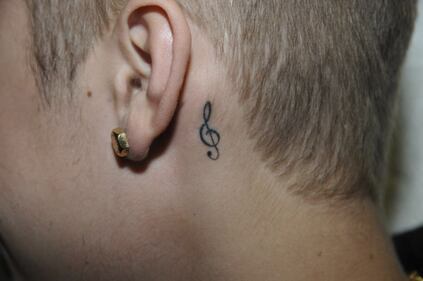 Justin Bieber, le foto dei tatuaggi in centrale 7