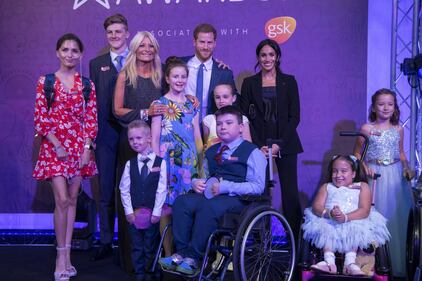 Meghan Markle e il Principe Harry tra i bimbi per beneficenza 8