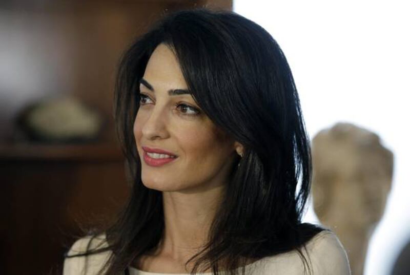 Amal Alamuddin: icona di stile al fianco di George Clooney 12
