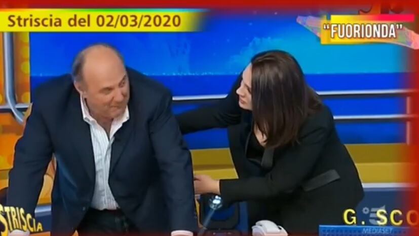 Gerry Scotti ha un "malore" a Striscia. La Manzini: "Hai un crampo al testicolo?"