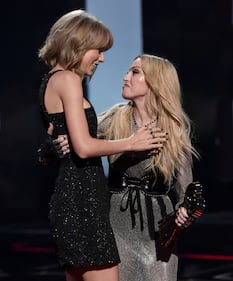 Taylor Swift sexy agli iHeartRadio Music Awards: vince e duetta con Madonna 16