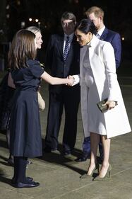 Meghan Markle chic in bianco: foto 9