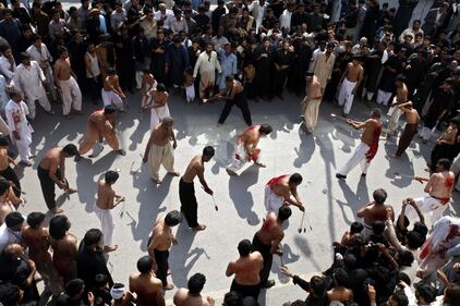 Gli sciiti del Pakistan commemorano l'Ashura 12