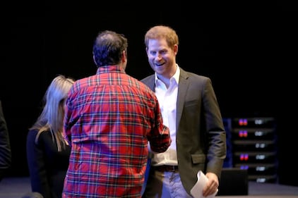 Principe Harry, le foto del convegno sul turismo 1