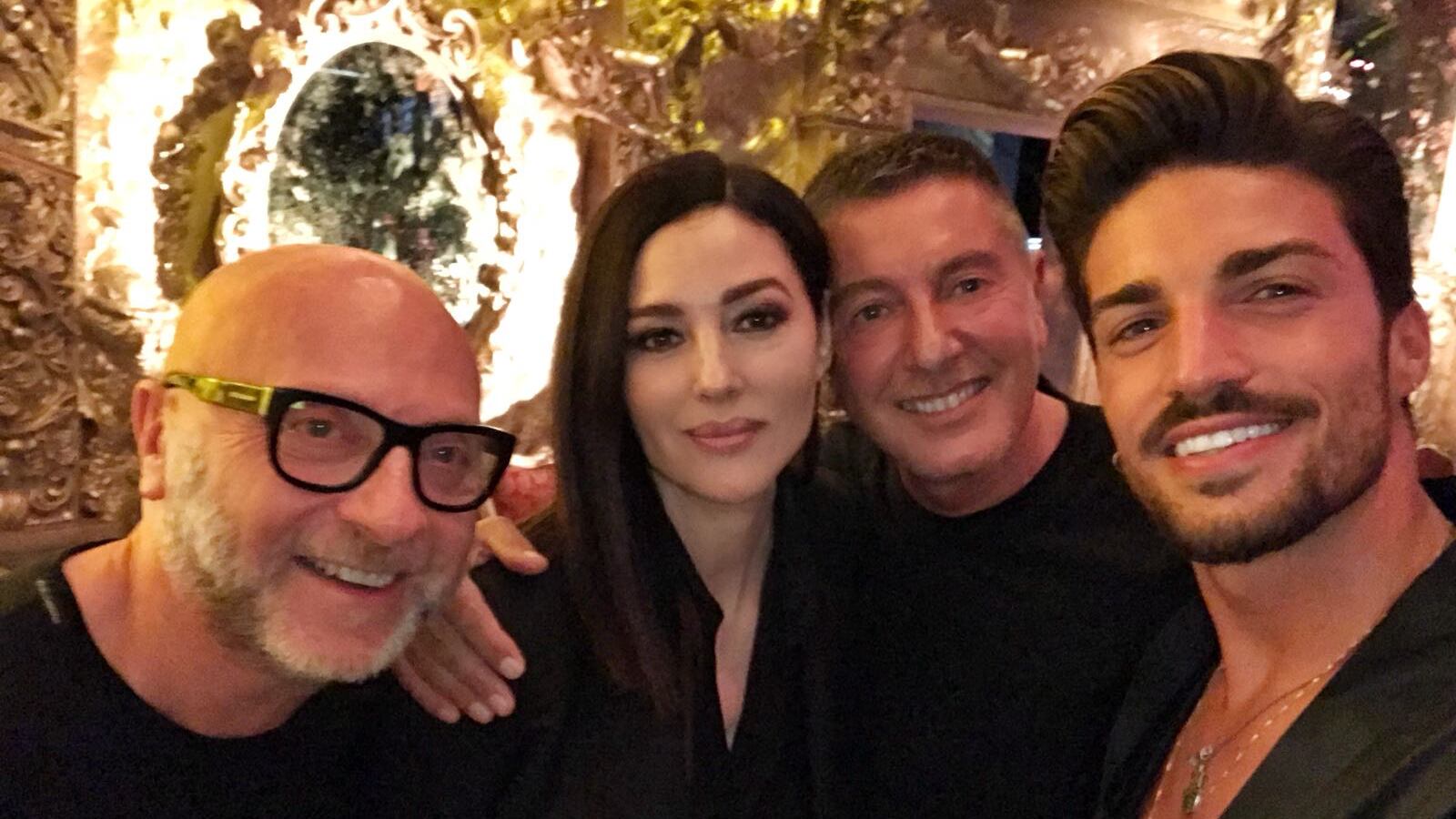 Bellucci e Di Vaio, icone di eleganza sulla passerella di Dolce & Gabbana