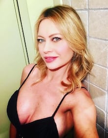 Anna Falchi, topless in piscina 5