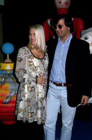 Il colpo di fulmine, la figlia e i guai giudiziari: la storia d'amore tra Heather Parisi e Giorgio Manenti