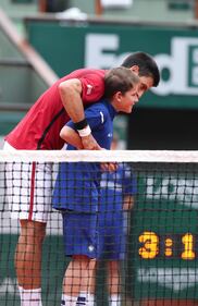 Lo splendido regalo di Djokovic al giovane raccattapalle 11