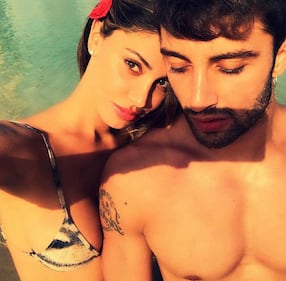 Belen Rodriguez baciata dal sole 6