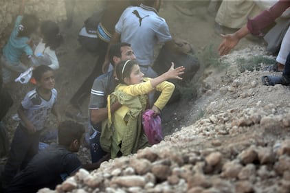 I profughi sfondano il confine tra Turchia e Siria 1