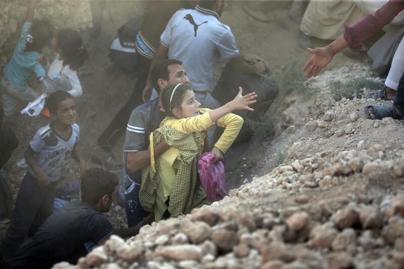 I profughi sfondano il confine tra Turchia e Siria 1