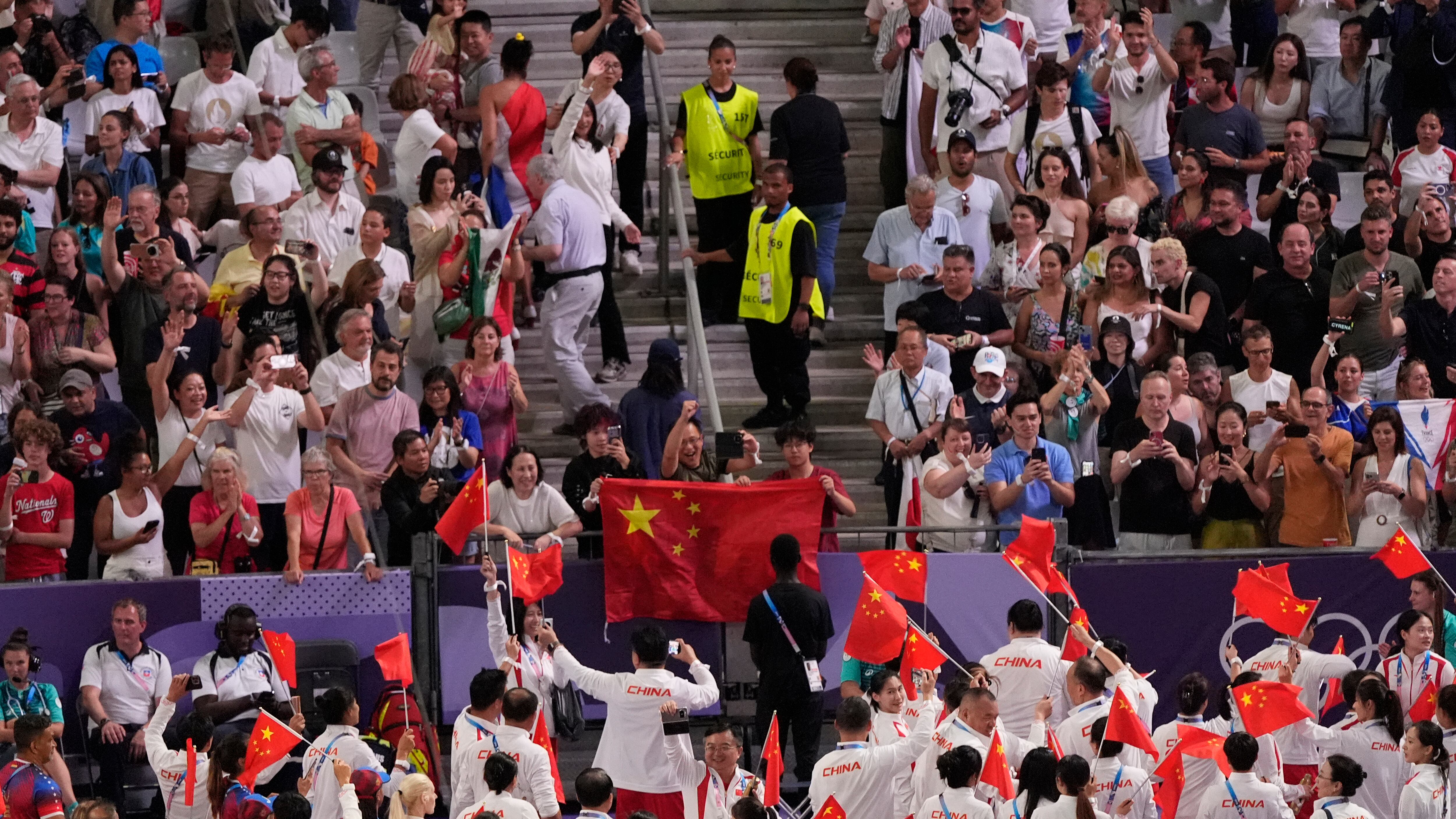 Medaglie, uniformi per gli atleti e tecnologia: le Olimpiadi delle “prime volte” della Cina