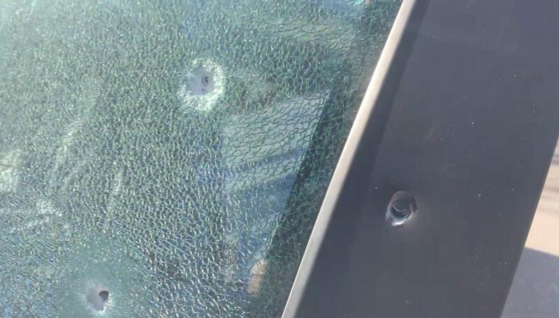 Sparatoria a Taranto, le foto: auto crivellata, 2 poliziotti feriti 8