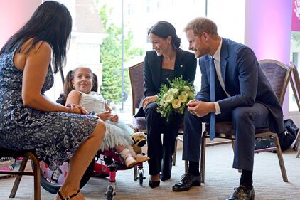 Meghan Markle e il Principe Harry tra i bimbi per beneficenza 6