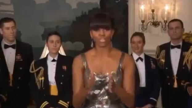 Michelle Obama contestata da un'attivista gay