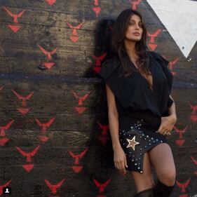 Cristina Buccino in microbikini pubblicizza il suo sito 9