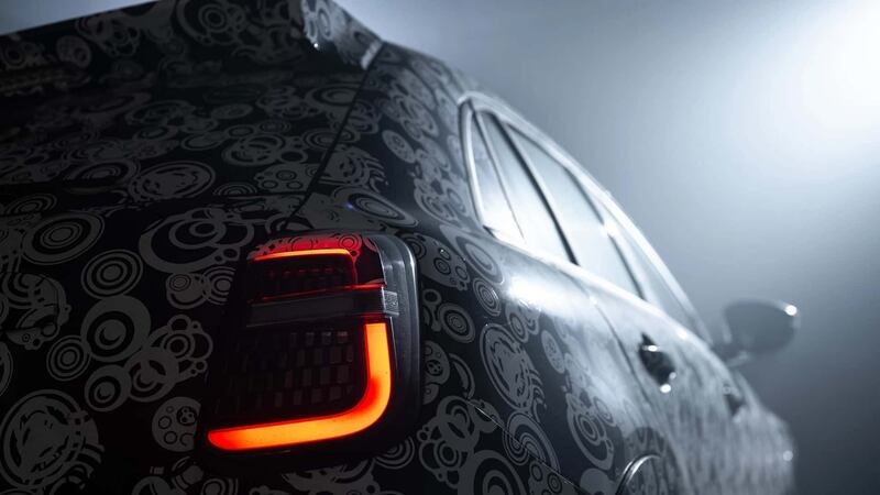 Abarth 600e, guarda tutte le foto della versione camuffata 11