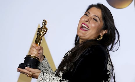 Oscar, i vincitori stringono le statuette 15