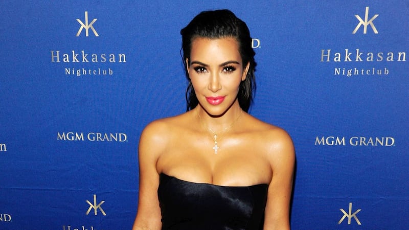 Kim Kardashian sexy in foto 7
